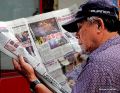 14 Reading a Newspapter