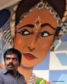22 Man and Mural in Little India