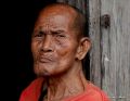 27 Old Man At A Wooden Wall in Color