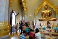 7 Tourists at the Temple